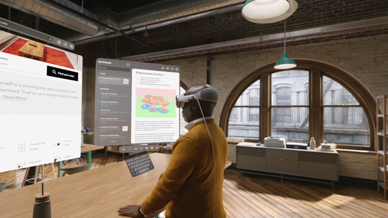 Man using virtual reality headset in modern office space.